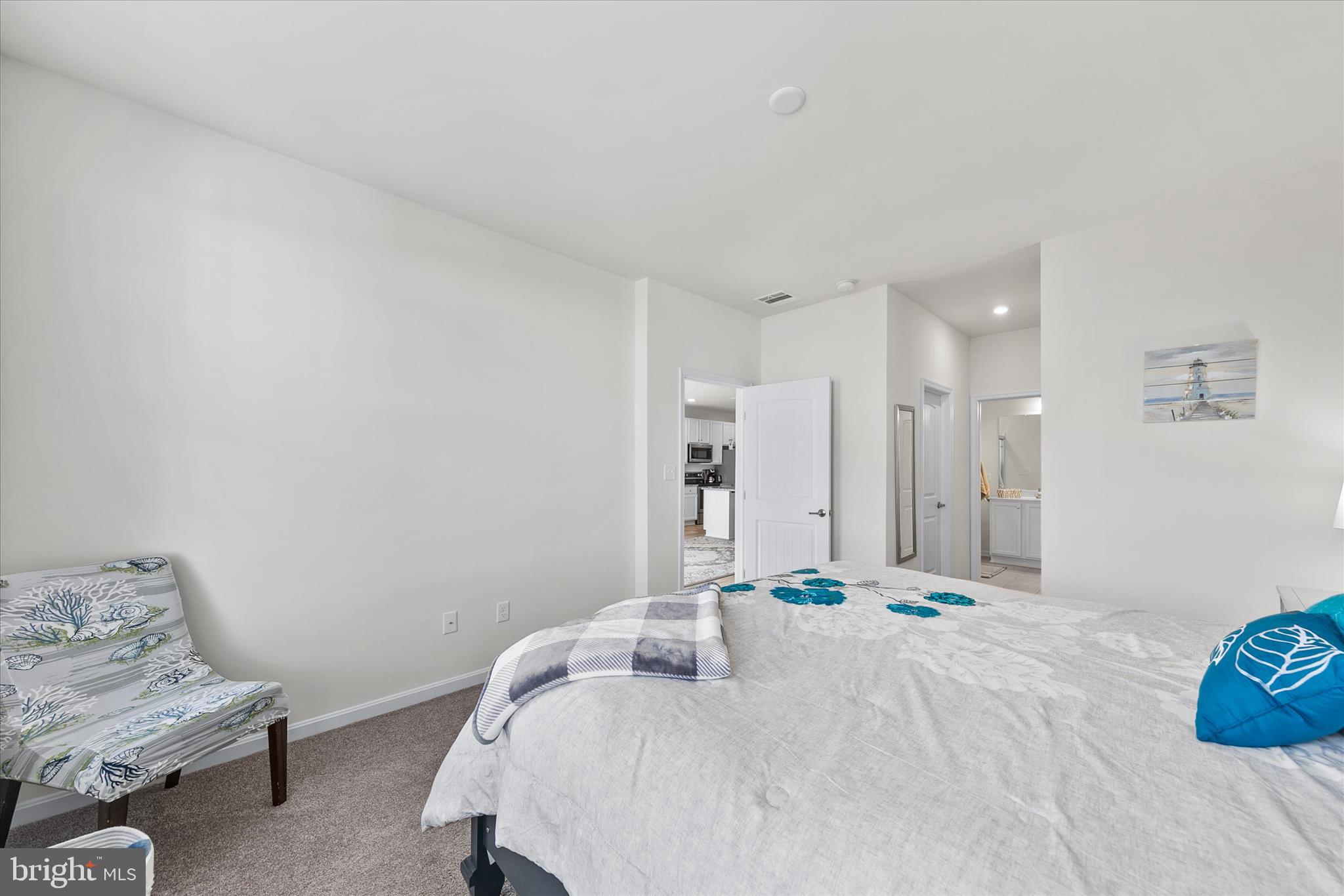 33204 Cross Road Frankford, DE 19945 - Photo 28 of 35 a bedroom with a bed and a couch