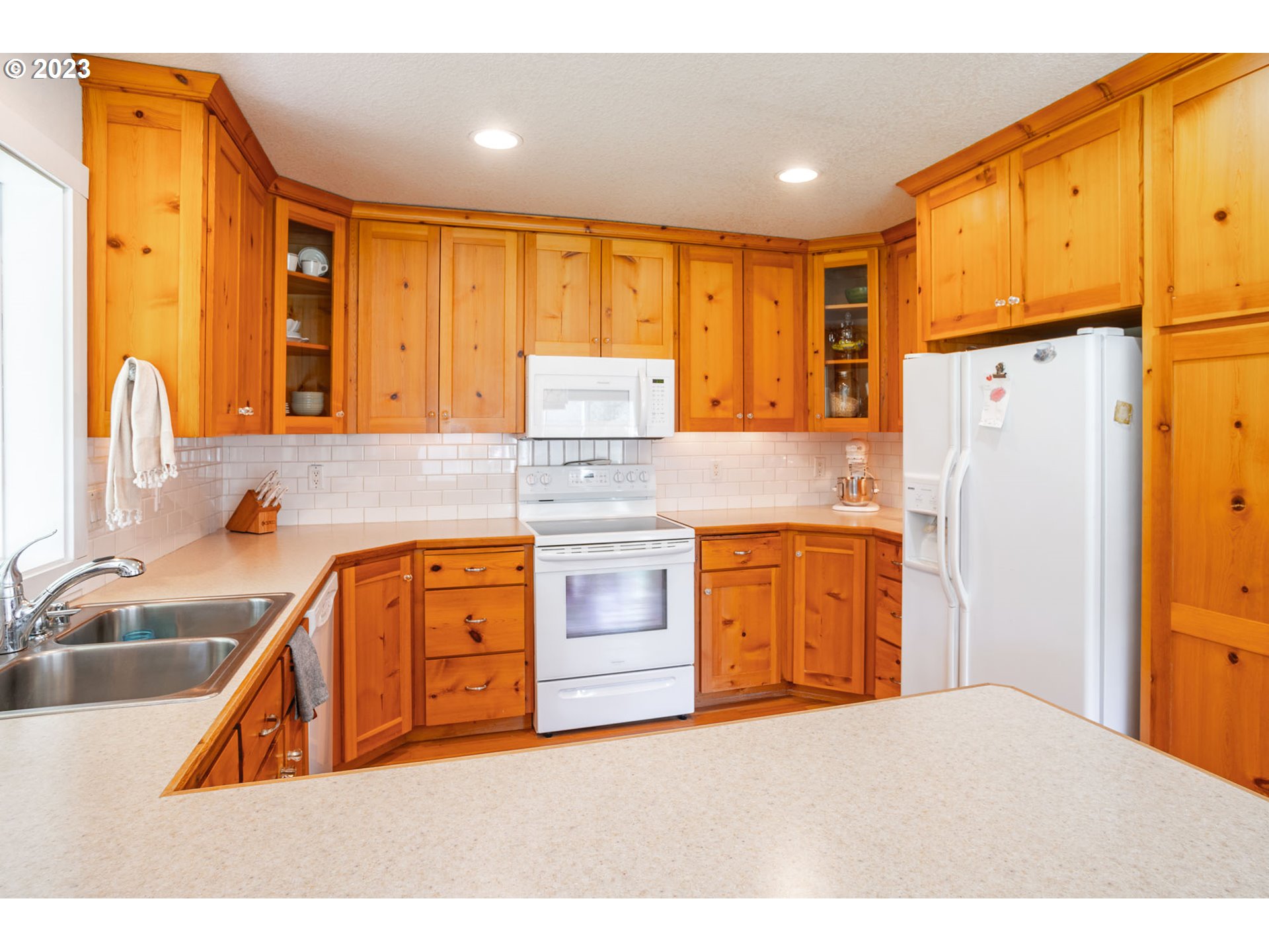 29416 Northeast Healy Road, Unit 2 Amboy, WA 98601 - Photo 24 of 41 a kitchen with stainless steel appliances granite countertop a sink a stove and refrigerator