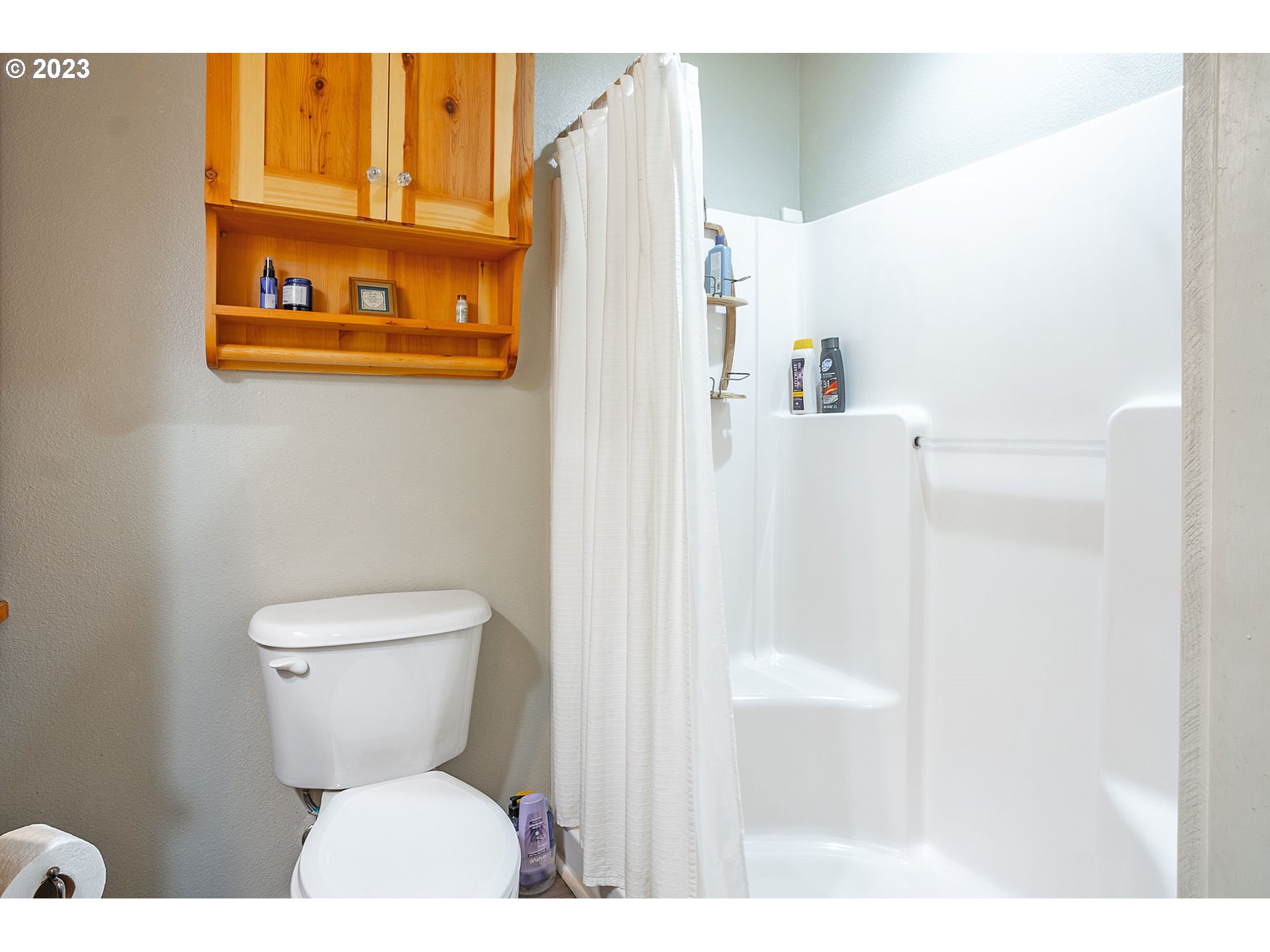 29416 Northeast Healy Road, Unit 2 Amboy, WA 98601 - Photo 36 of 41 a bathroom with a toilet and a picture