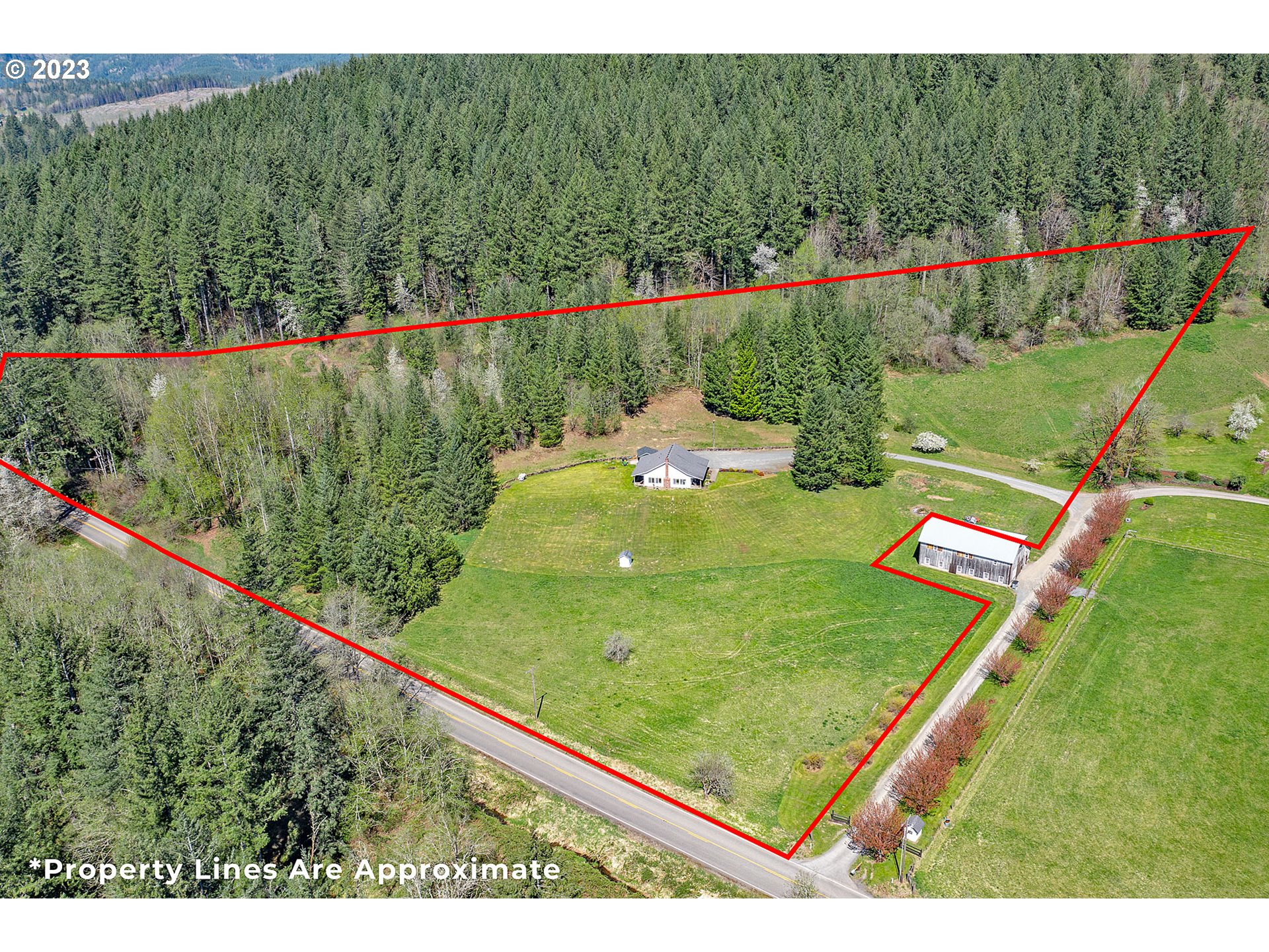29416 Northeast Healy Road, Unit 2 Amboy, WA 98601 - Photo 40 of 41 a view of a back yard from a balcony