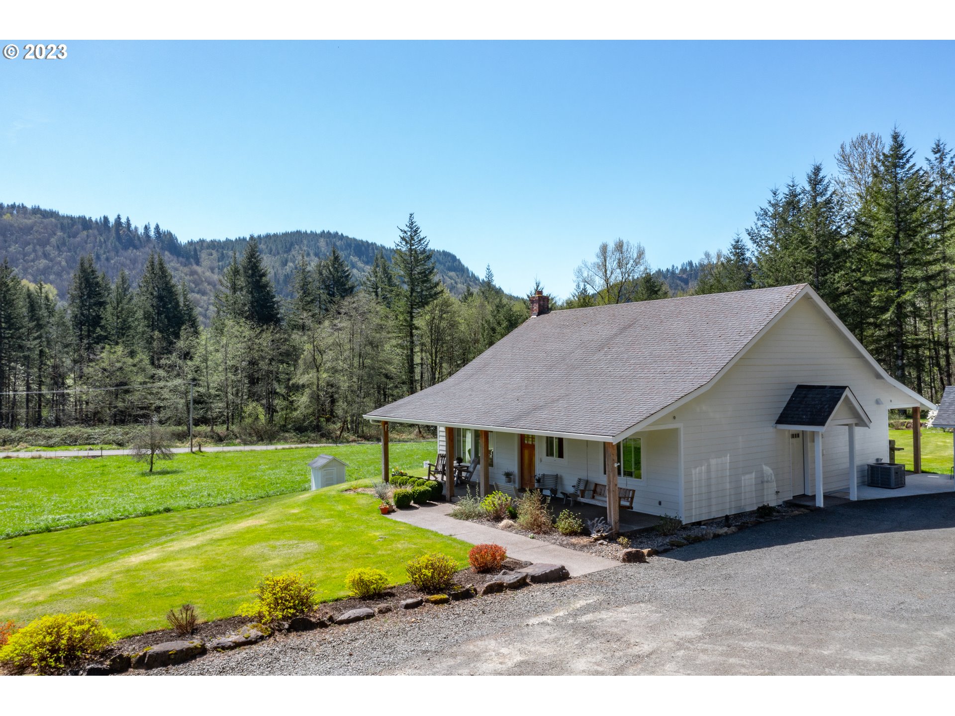 29416 Northeast Healy Road, Unit 2 Amboy, WA 98601 - Photo 7 of 41 a aerial view of a house with garden