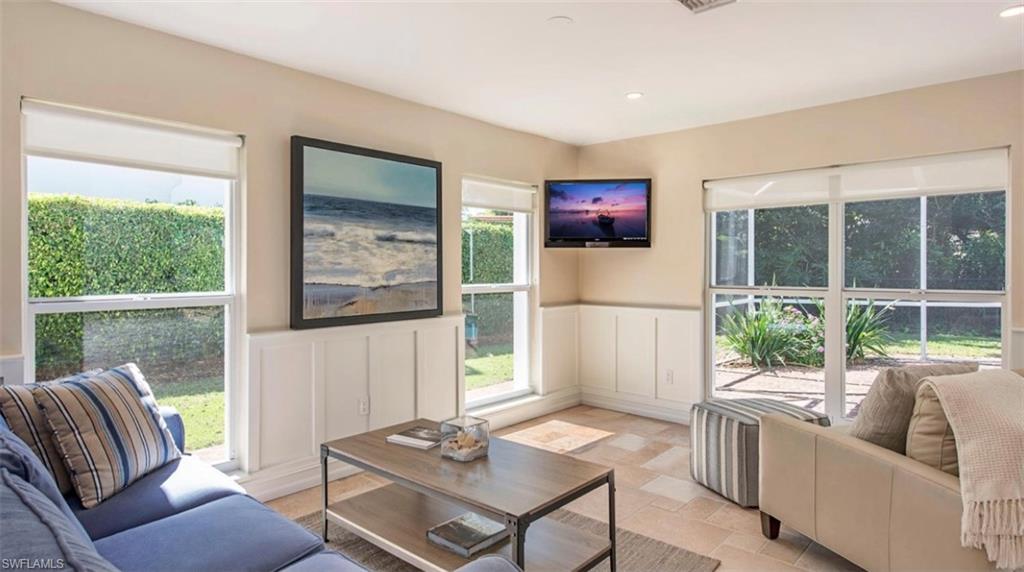 508 Devils Lane Naples, FL 34103 - Photo 3 of 15 a living room with furniture and a large window