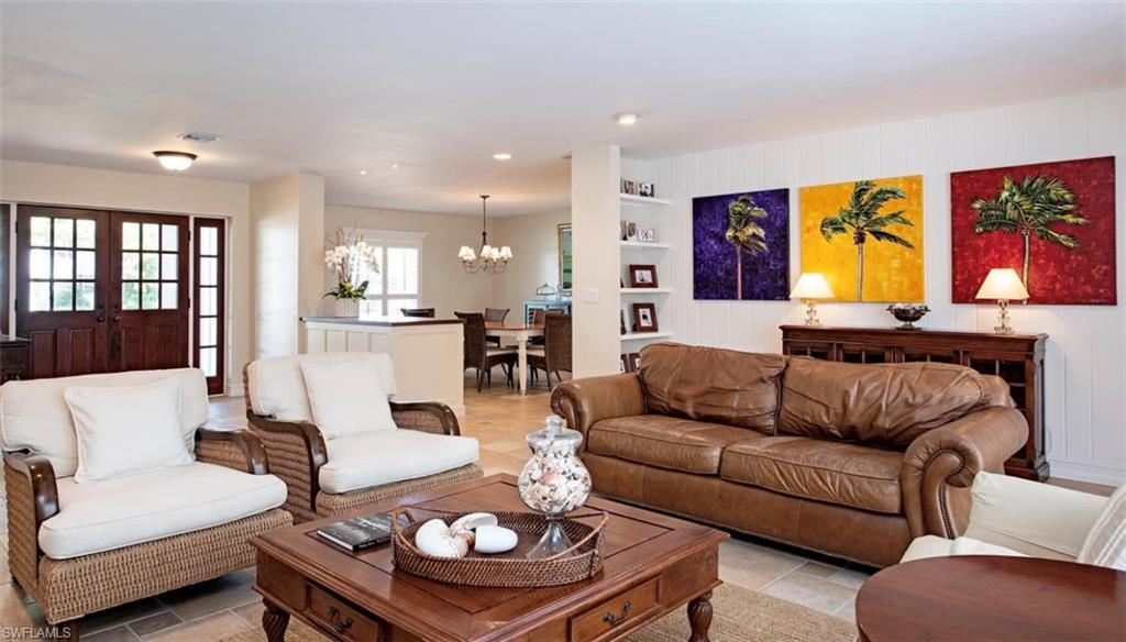 508 Devils Lane Naples, FL 34103 - Photo 4 of 15 a living room with furniture and painting on the wall