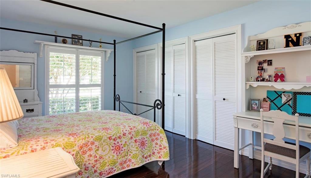 508 Devils Lane Naples, FL 34103 - Photo 10 of 15 a bedroom with a bed and a window