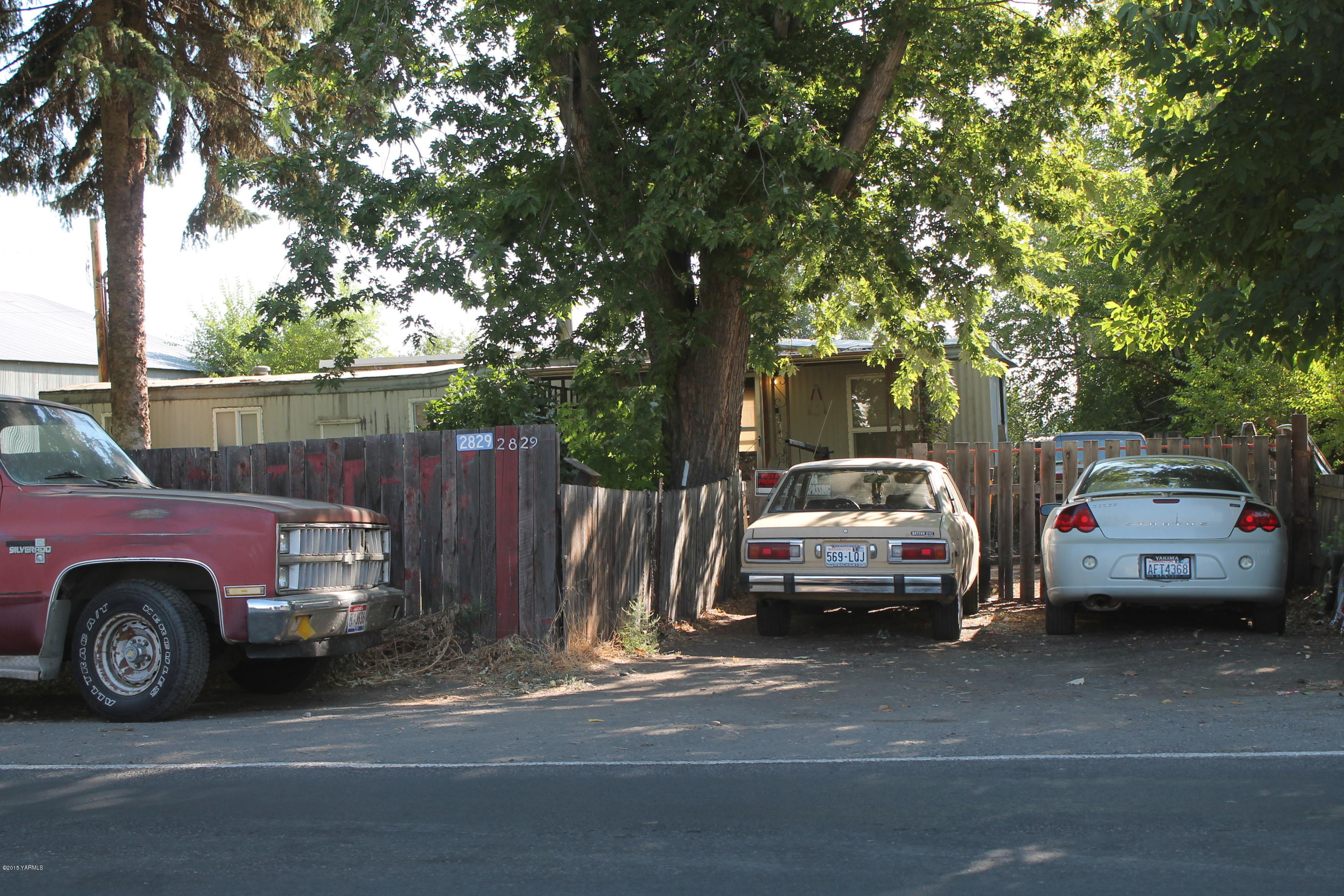 2829 Wiley Road Yakima, WA 98903 - Photo 1 of 1 a view of a cars parked in front of a house
