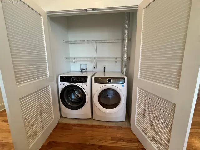 a utility room with dryer and washer