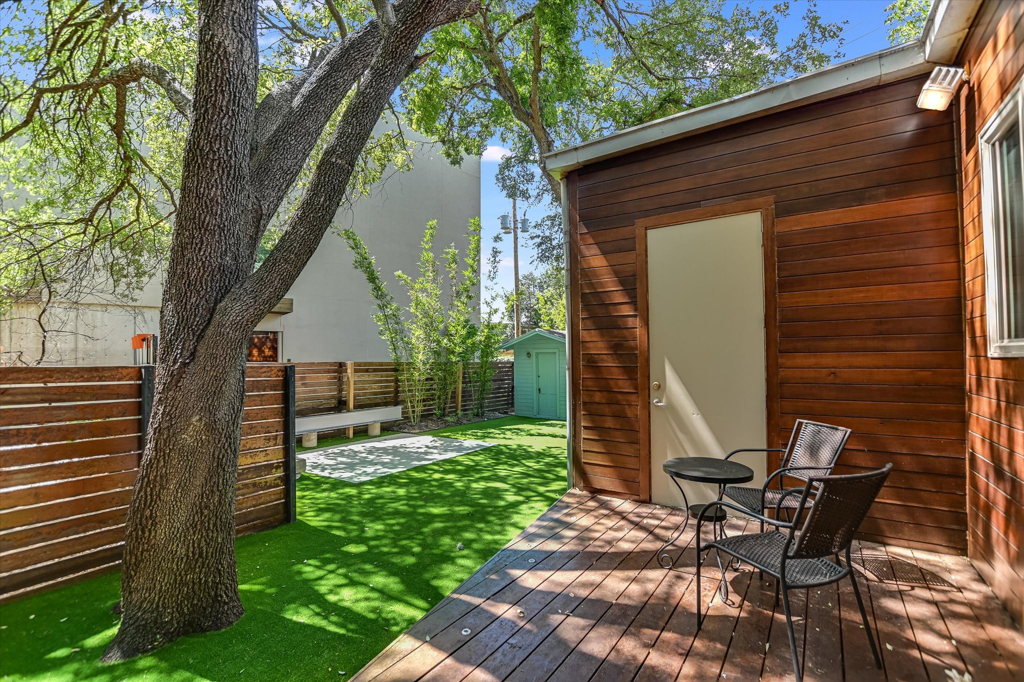 2109 Nickerson Street Austin, TX 78704 - Photo 20 of 23 a view of a chair and table in backyard of the house
