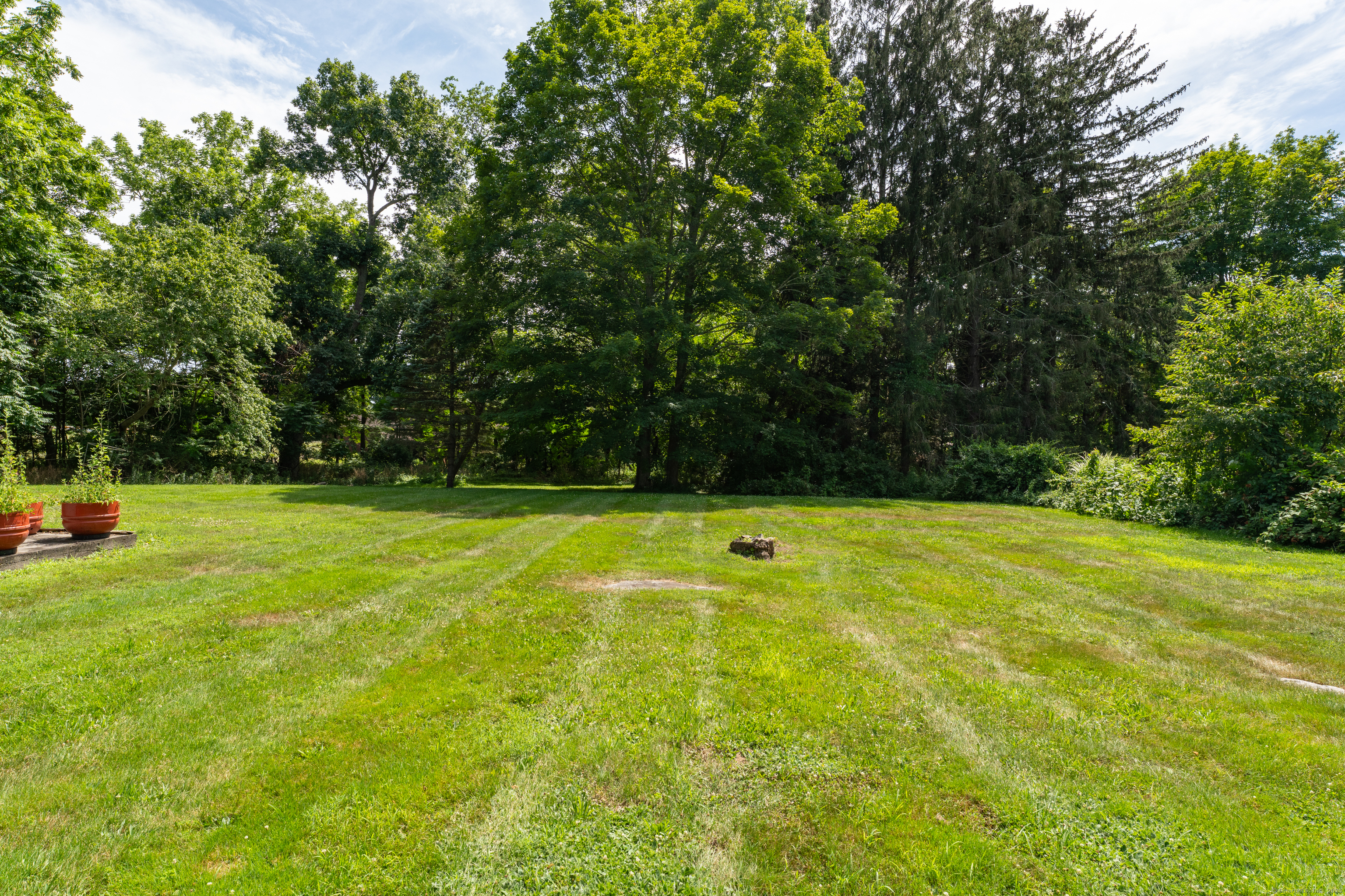 108 Boston Post Road Madison, CT 06443 - Photo 24 of 27 a view of a swimming pool with a yard