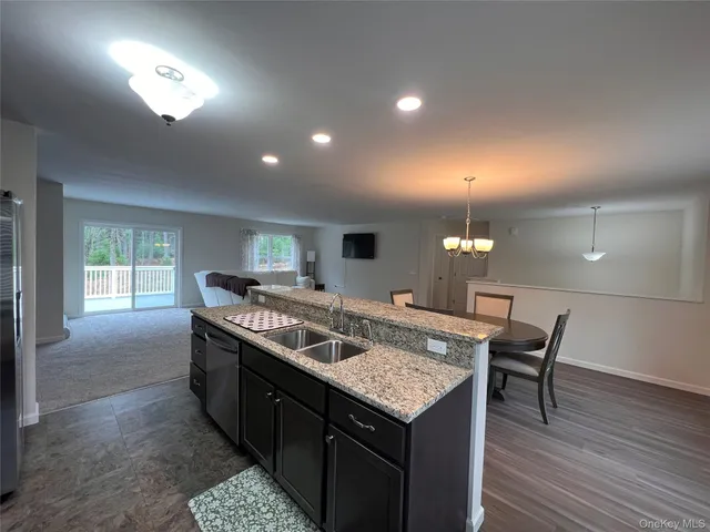 a kitchen with a stove and cabinets