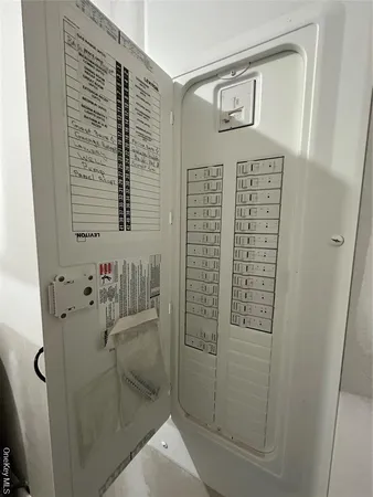 a bathroom with a shower and a sink