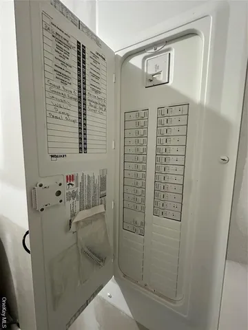 a bathroom with a shower and a sink