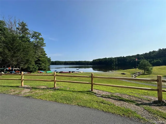 a view of a golf course with a house