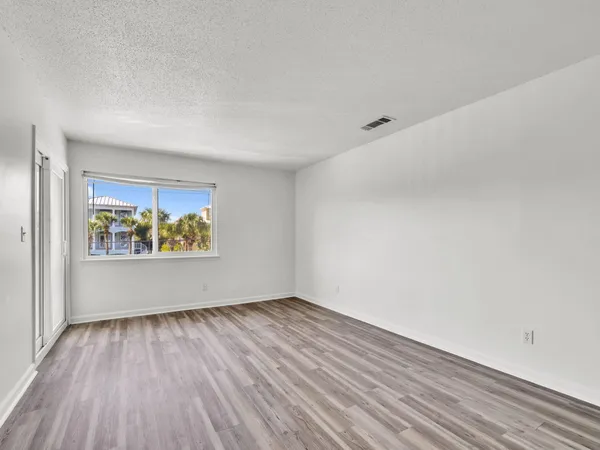 a view of an empty room and window