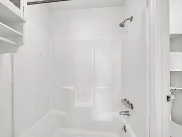 a bathroom with a bathtub