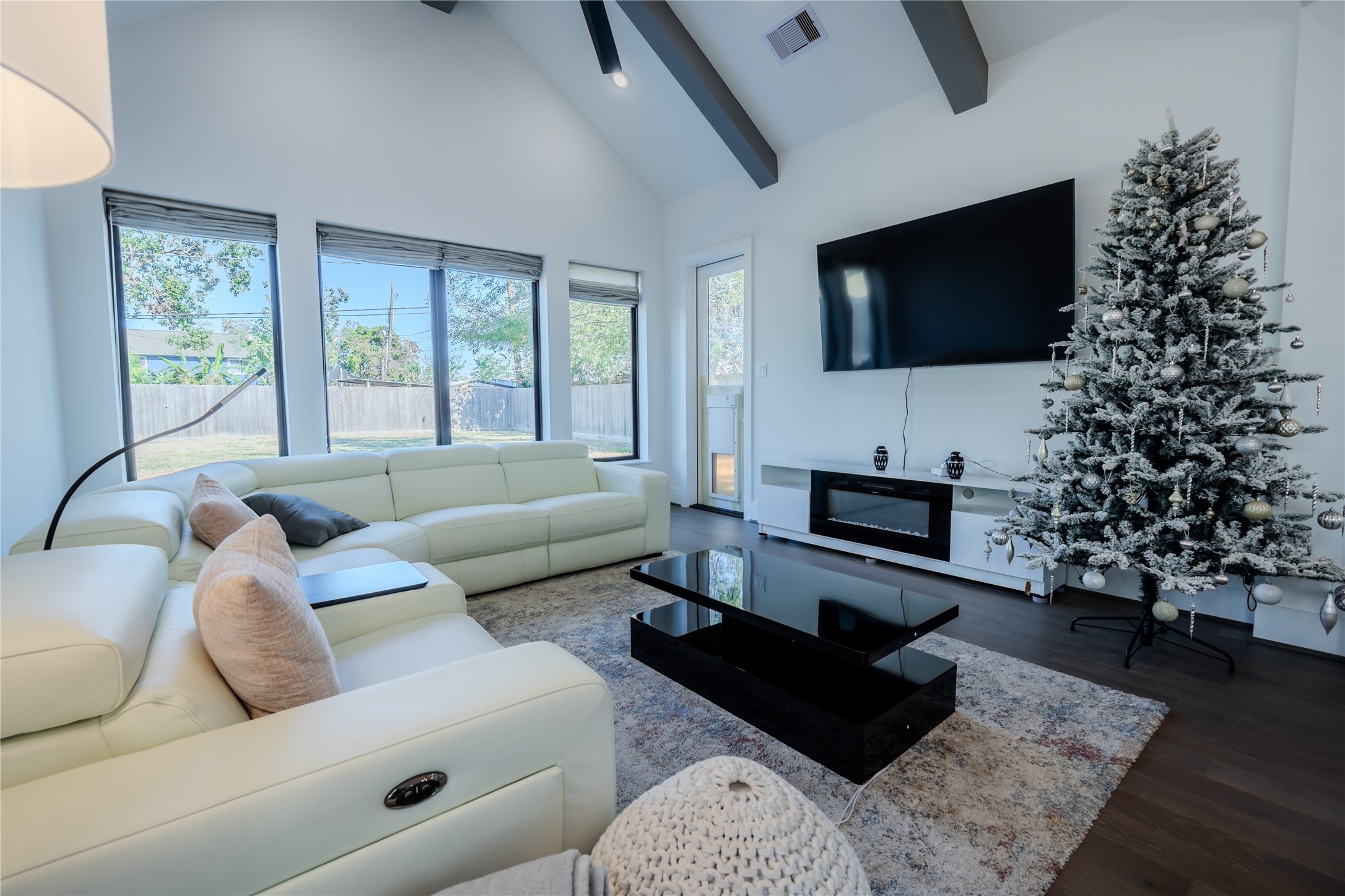 8810 Carousel Lane Houston, TX 77080 - Photo 12 of 37 a living room with furniture fireplace and flat screen tv