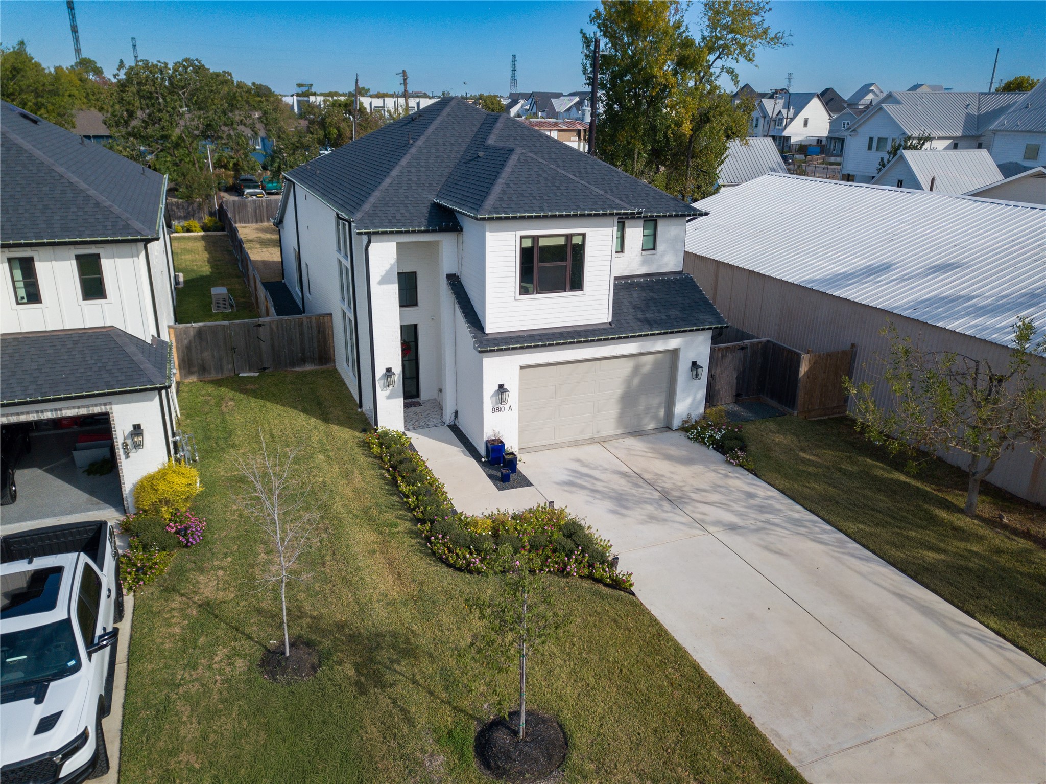 8810 Carousel Lane Houston, TX 77080 - Photo 2 of 37 a front view of a house with a yard