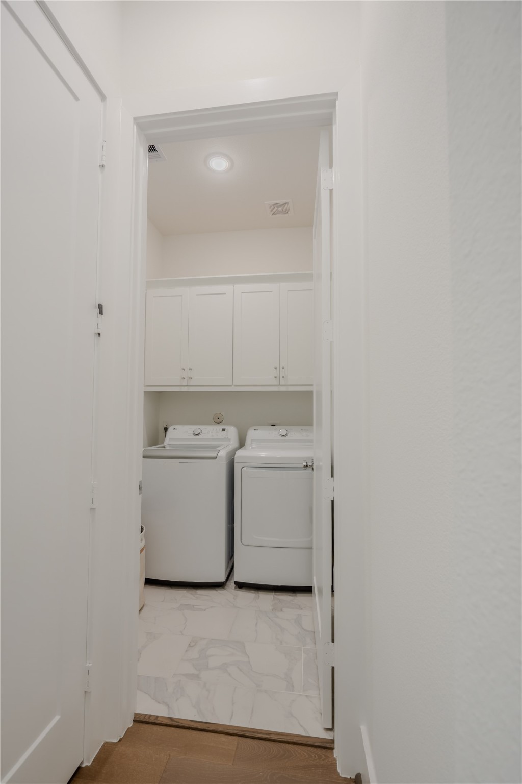 8810 Carousel Lane Houston, TX 77080 - Photo 24 of 37 a utility room with dryer and washer