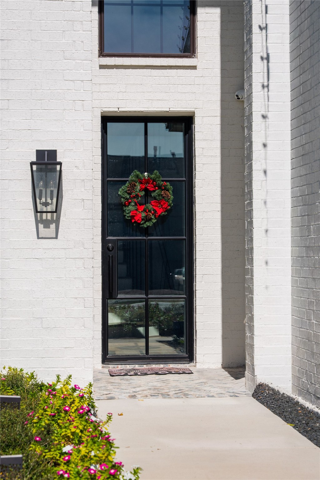 8810 Carousel Lane Houston, TX 77080 - Photo 3 of 37 a living room with a fireplace and flowers
