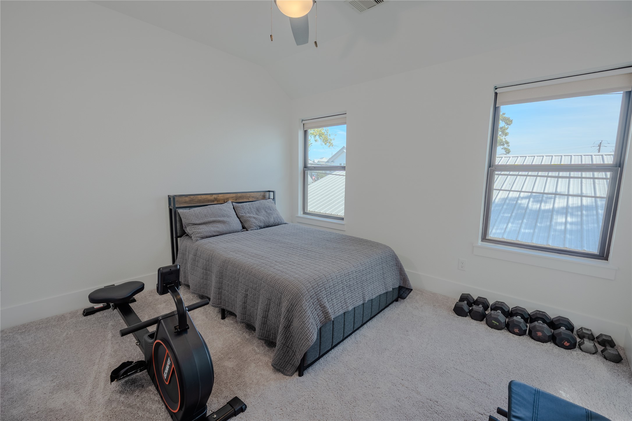 8810 Carousel Lane Houston, TX 77080 - Photo 31 of 37 a bedroom with a bed and a window