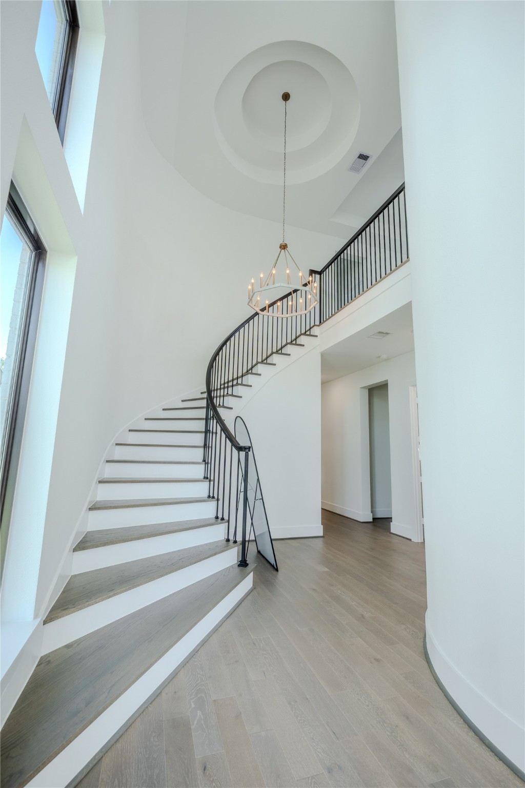 8810 Carousel Lane Houston, TX 77080 - Photo 4 of 37 a view of staircase with white walls and a window