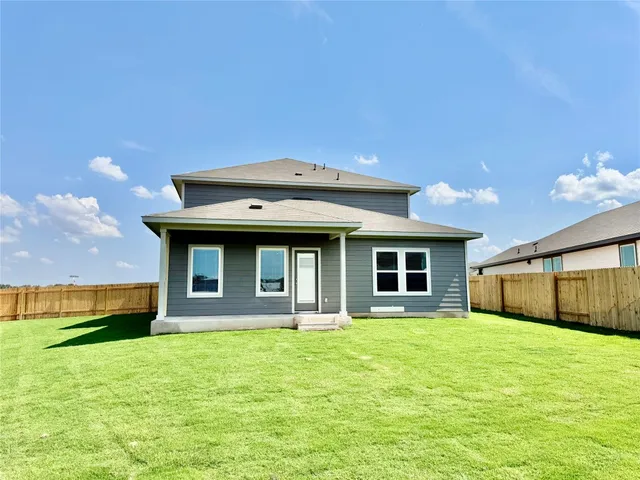 a front view of house with yard