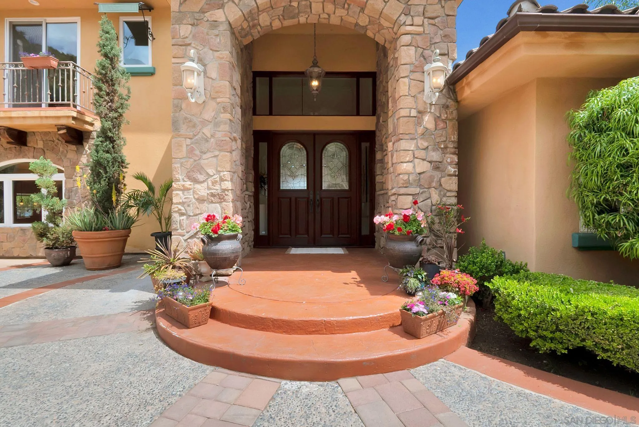 12920 Glen Circle Road Poway, CA 92064 - Photo 16 of 69 a front view of a house with outdoor seating