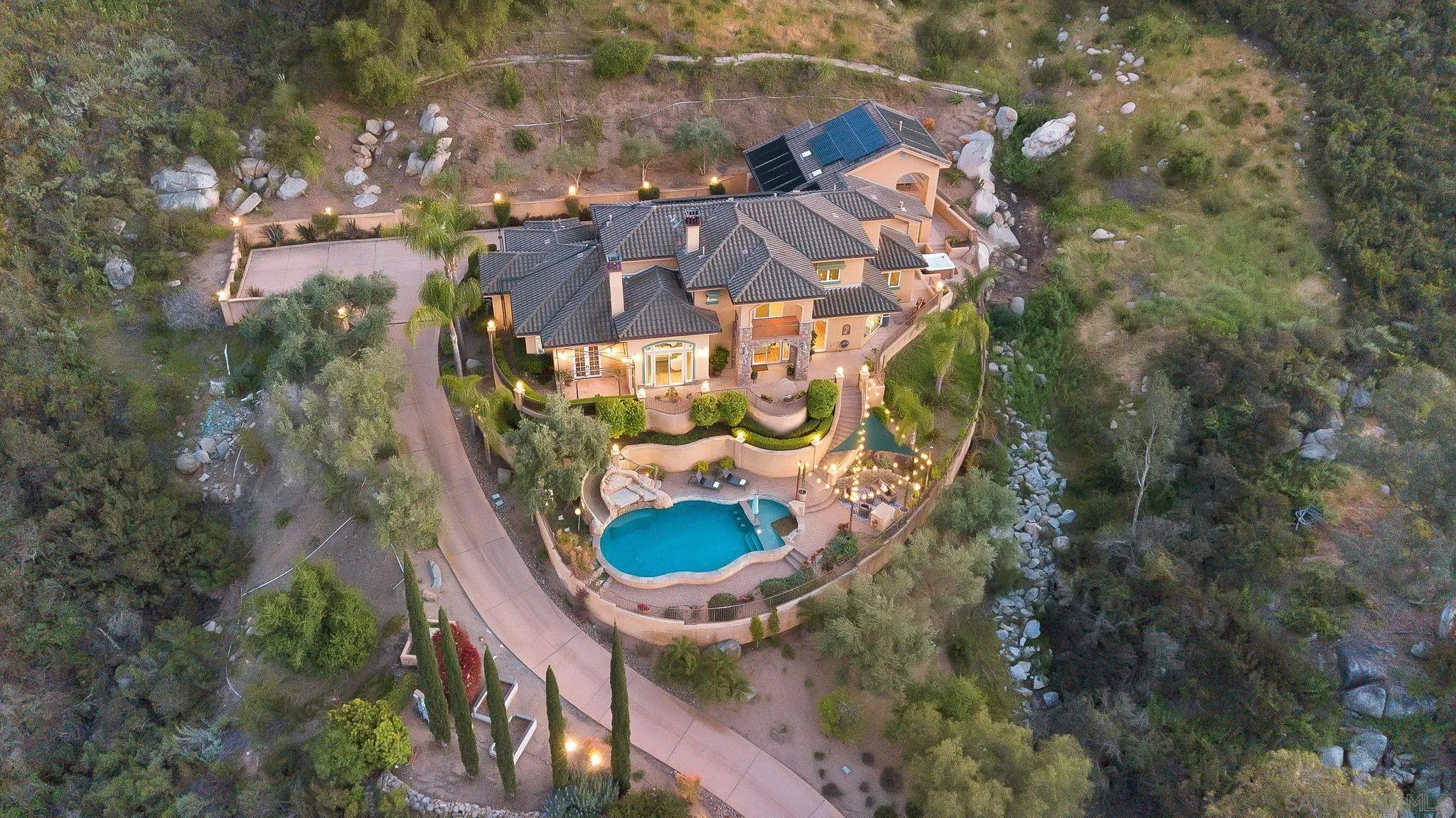 12920 Glen Circle Road Poway, CA 92064 - Photo 4 of 69 an aerial view of a house with a yard and large trees