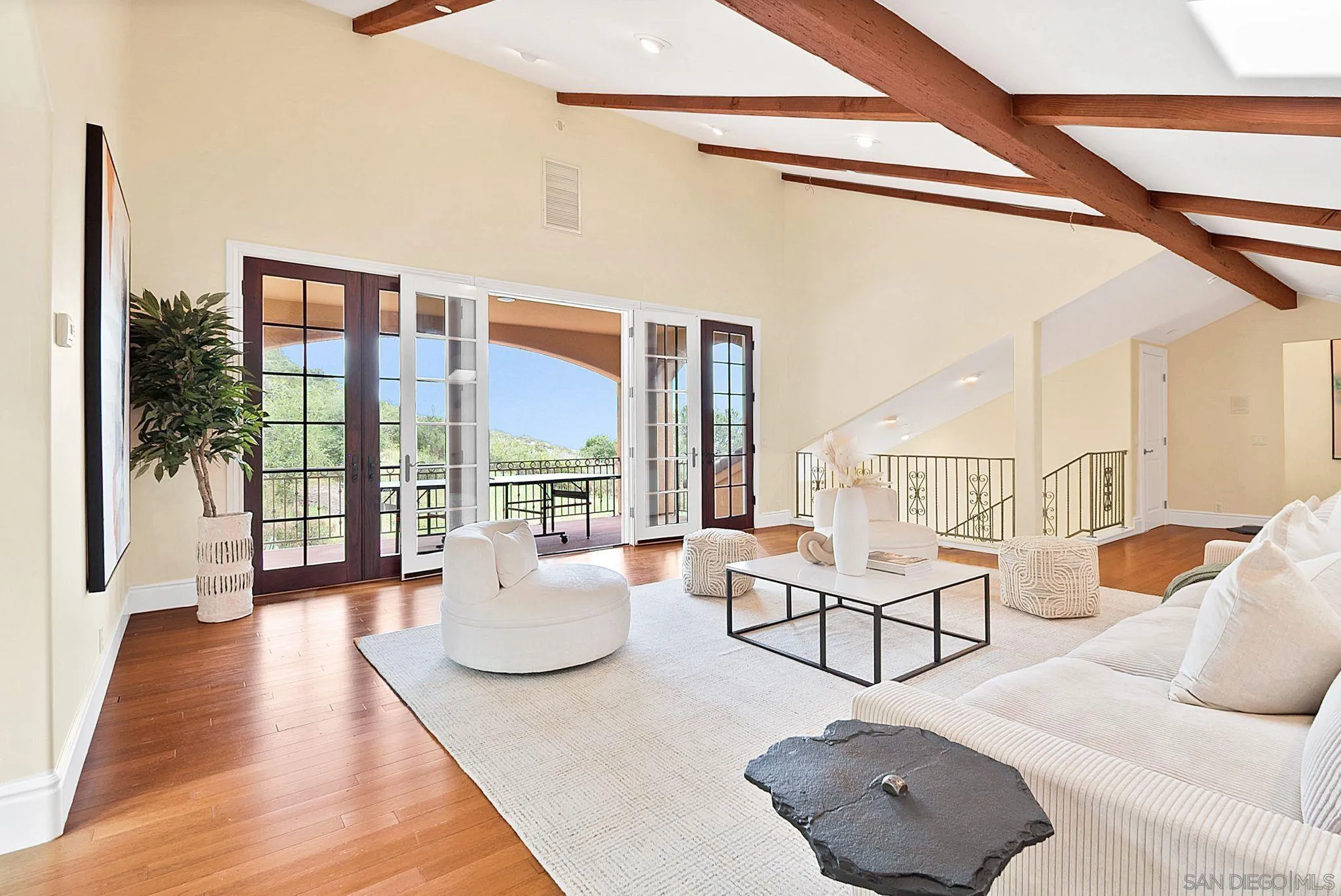 12920 Glen Circle Road Poway, CA 92064 - Photo 43 of 69 a living room with furniture and a floor to ceiling window
