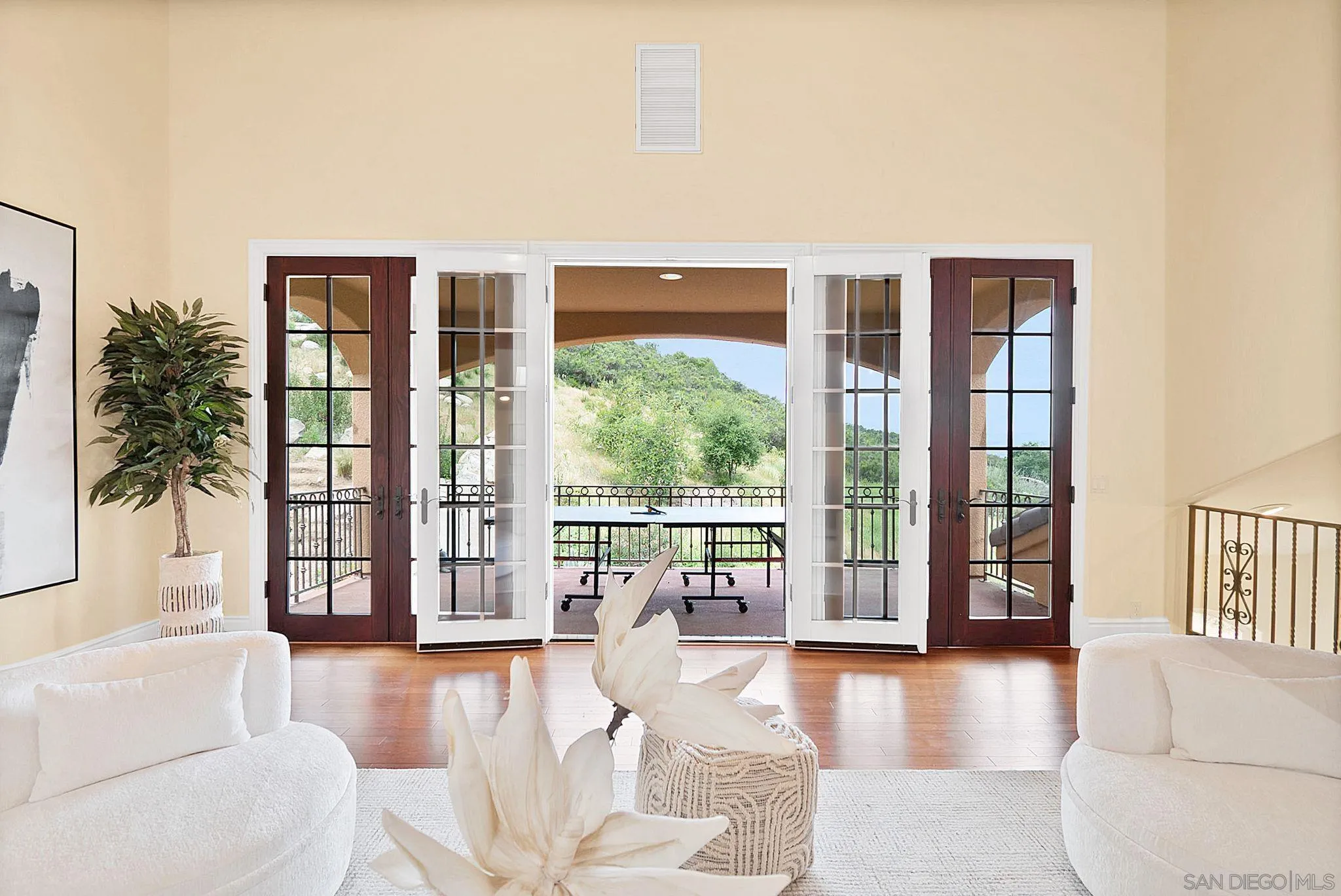 12920 Glen Circle Road Poway, CA 92064 - Photo 46 of 69 a living room with furniture and a large window with outer view