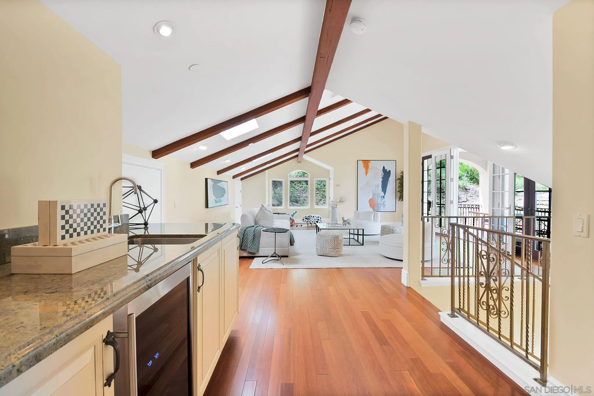 12920 Glen Circle Road Poway, CA 92064 - Photo 47 of 69 a open kitchen with stainless steel appliances granite countertop a lot of counter space and wooden floors