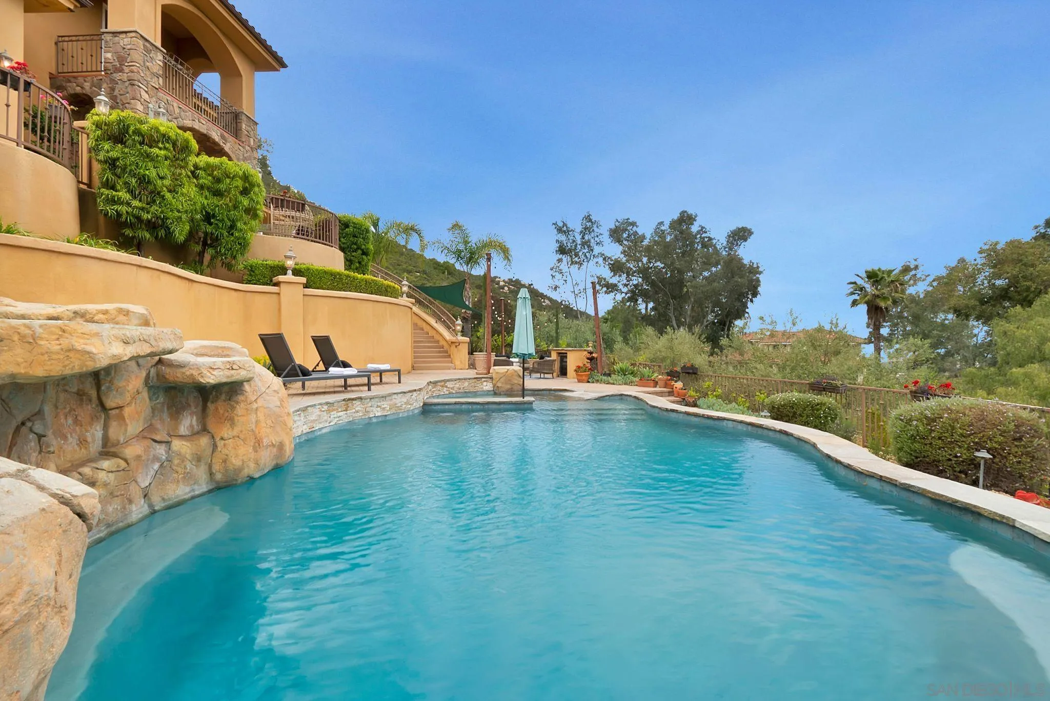 12920 Glen Circle Road Poway, CA 92064 - Photo 61 of 69 a view of a swimming pool with an outdoor space and seating area