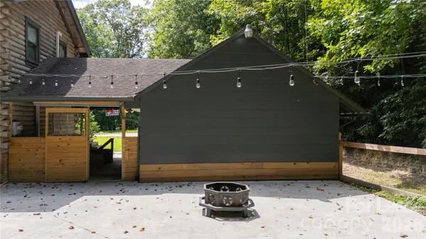 a front view of a house with parking space