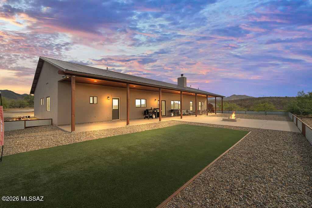 16276 East Empire View Road Vail, AZ 85641 - Photo 40 of 51 a view of an house with backyard space and a garden