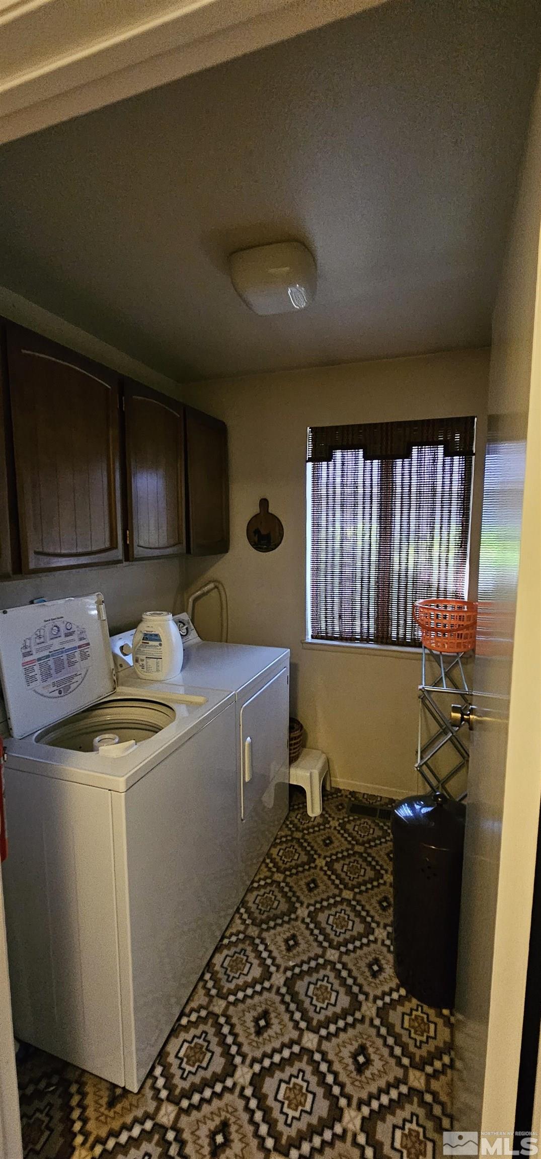 1475 Joshua Drive Reno, NV 89509 - Photo 21 of 27 a bath room with a sink and furniture