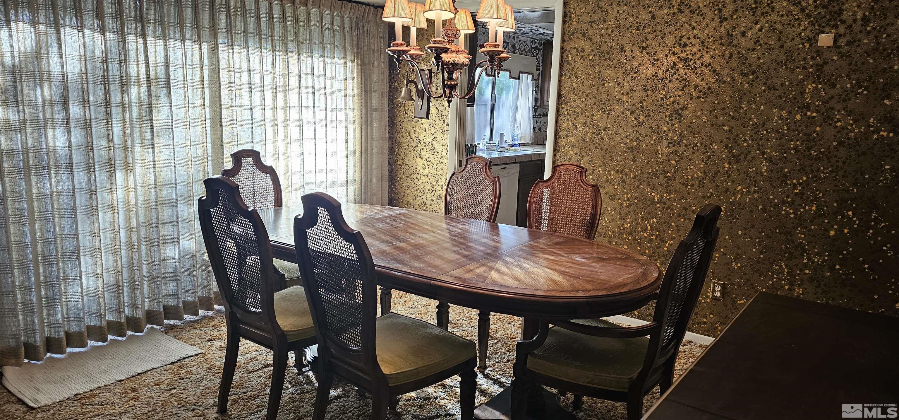 1475 Joshua Drive Reno, NV 89509 - Photo 6 of 27 a view of a dining room with furniture and window