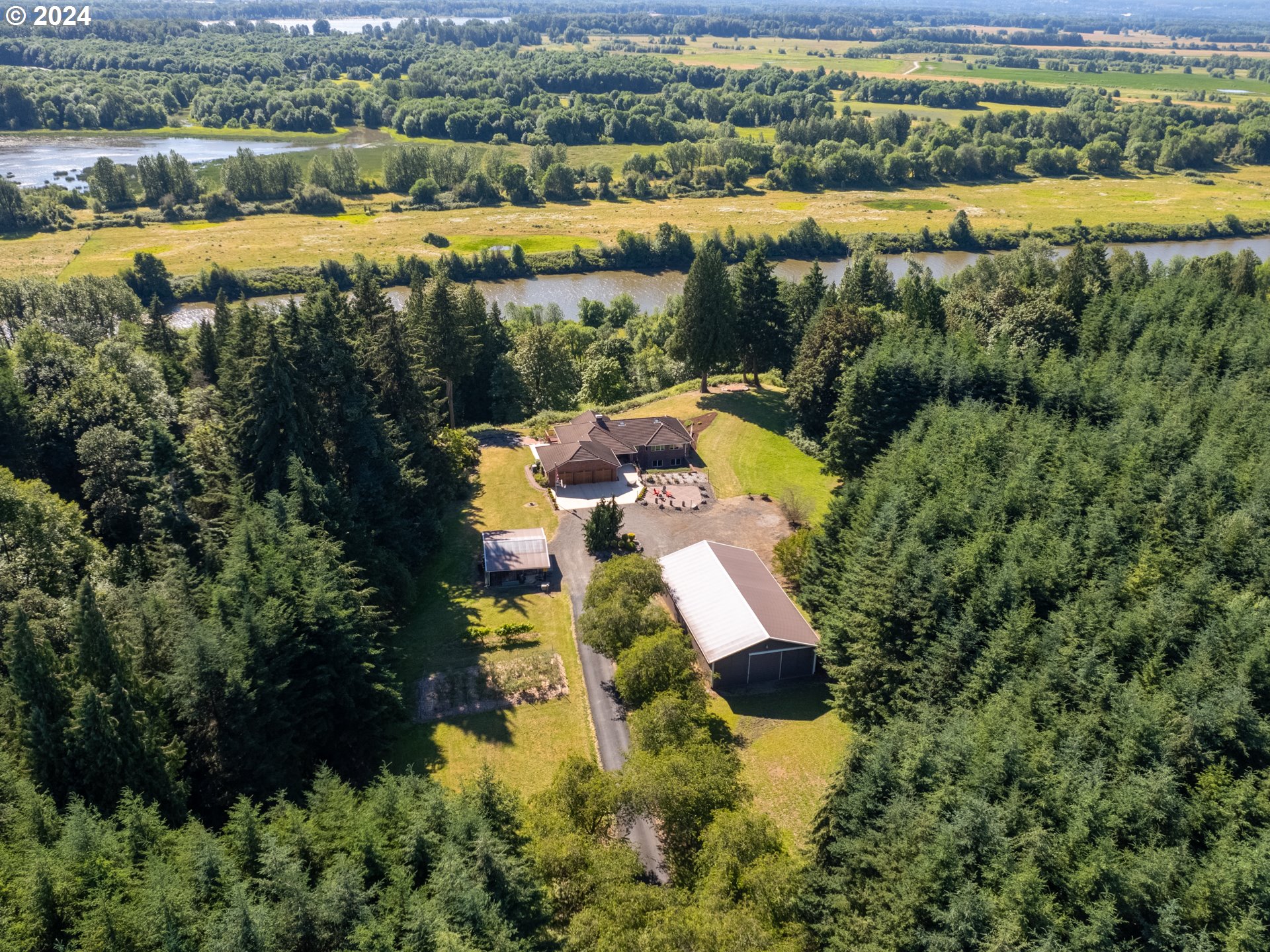 21920 Northwest 67th Avenue Ridgefield, WA 98642 - Photo 1 of 48 an aerial view of residential houses with outdoor space and river
