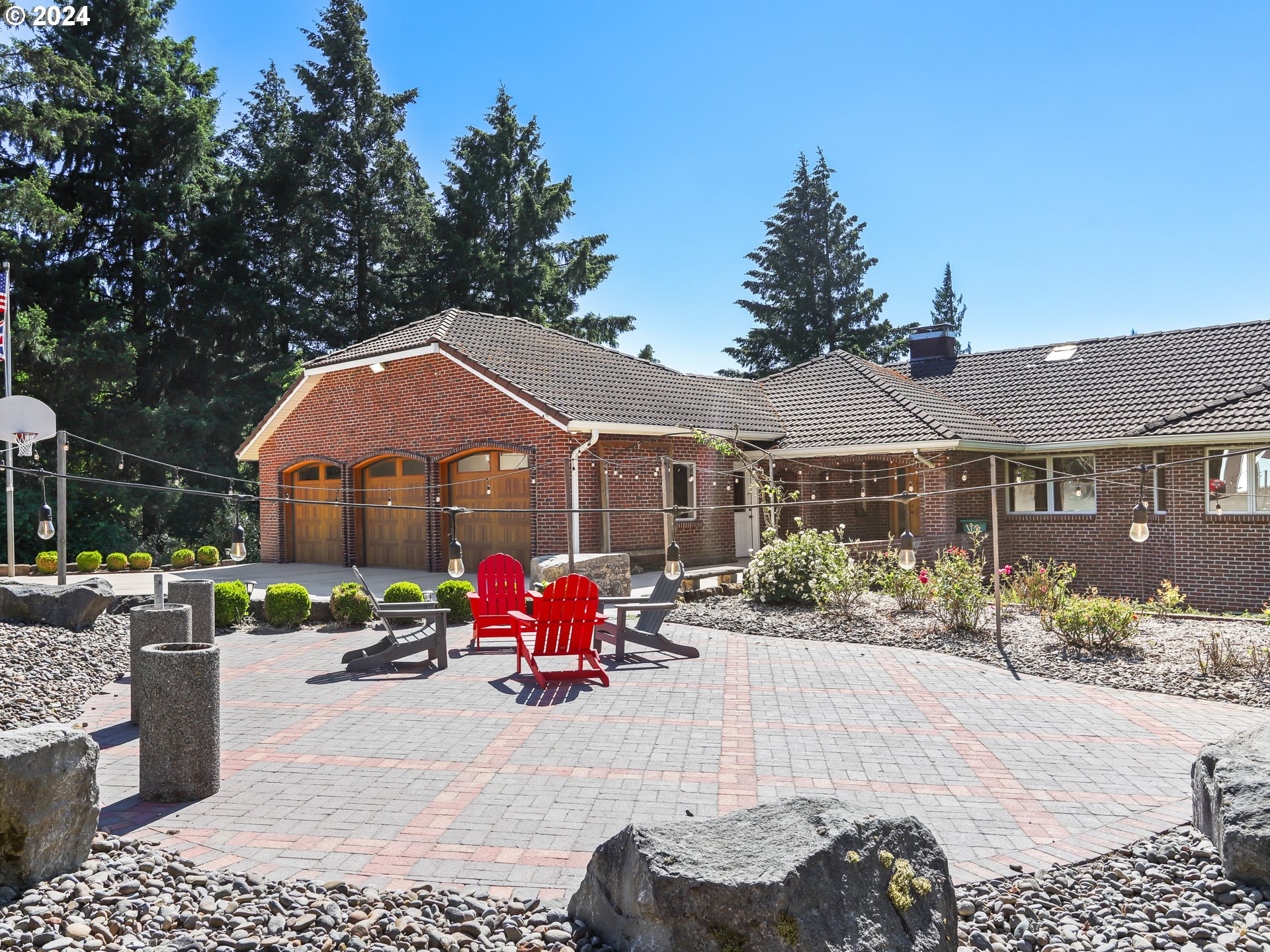 21920 Northwest 67th Avenue Ridgefield, WA 98642 - Photo 14 of 48 a front view of a house with a yard