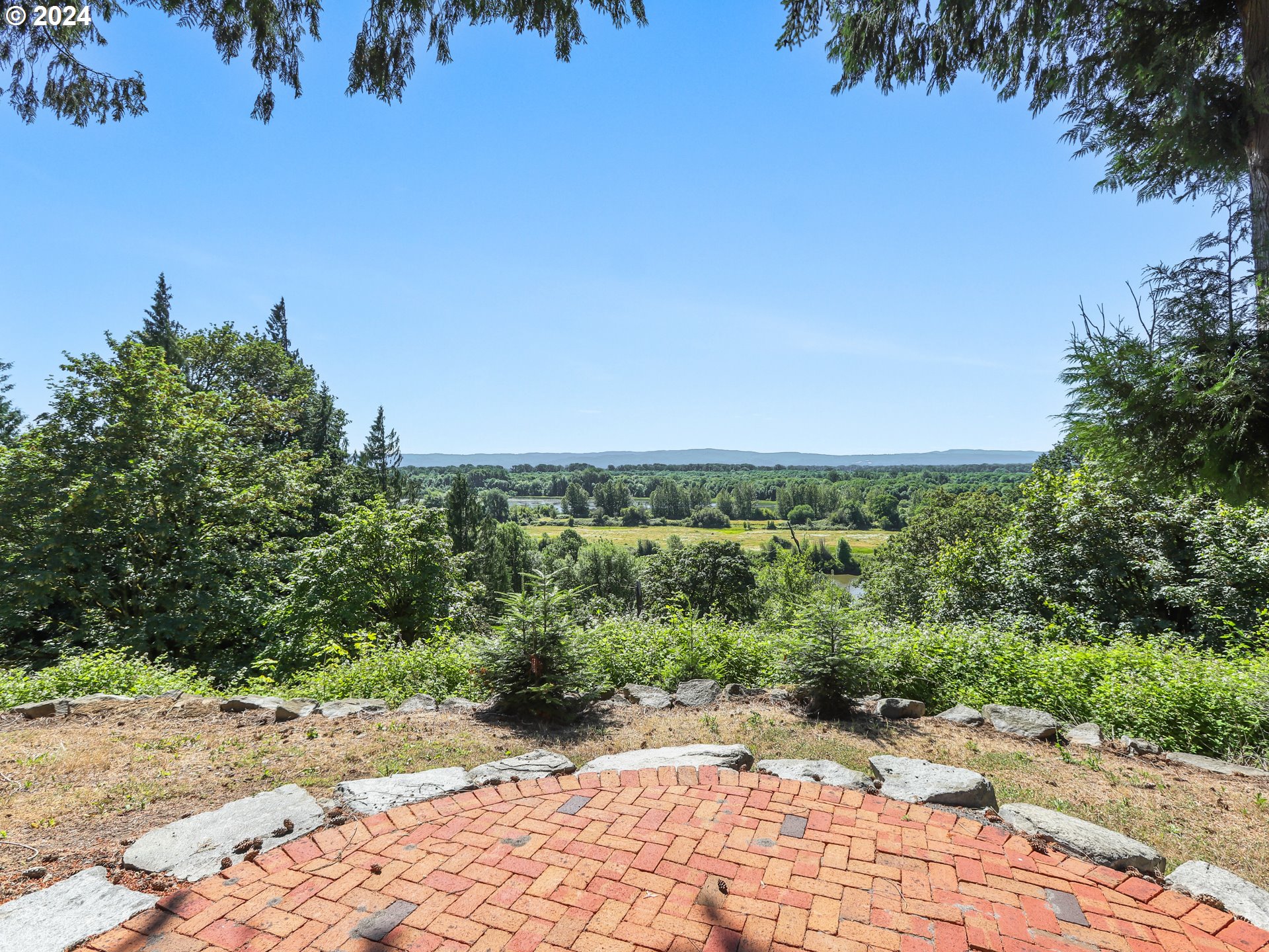 21920 Northwest 67th Avenue Ridgefield, WA 98642 - Photo 32 of 48 a view of a pathway both side of a yard
