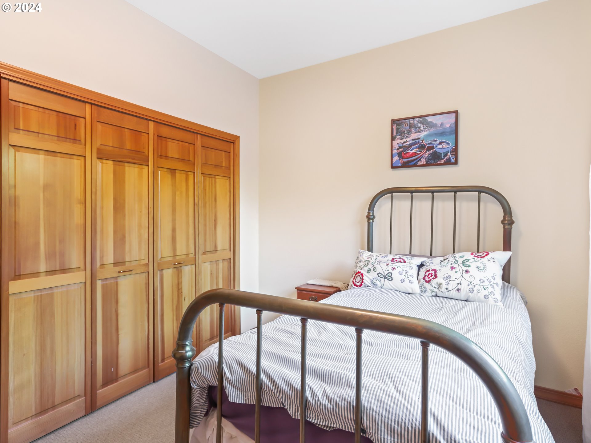 21920 Northwest 67th Avenue Ridgefield, WA 98642 - Photo 44 of 48 a bedroom with a bed and a window
