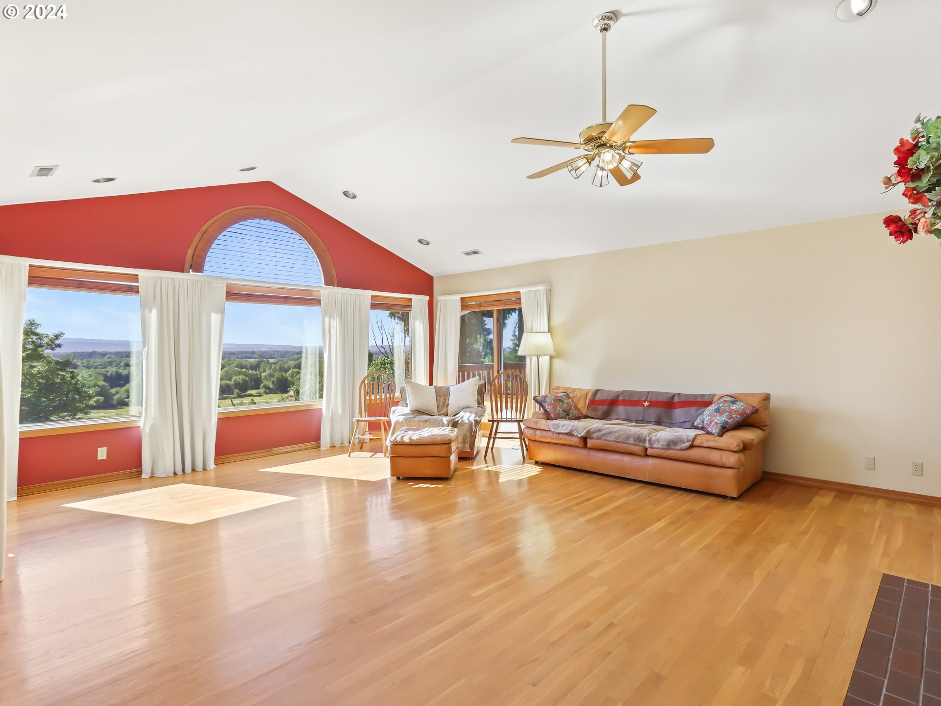 21920 Northwest 67th Avenue Ridgefield, WA 98642 - Photo 7 of 48 a living room with furniture and a large window