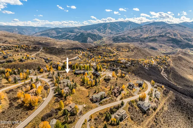 a view of a swimming pool with an outdoor seating