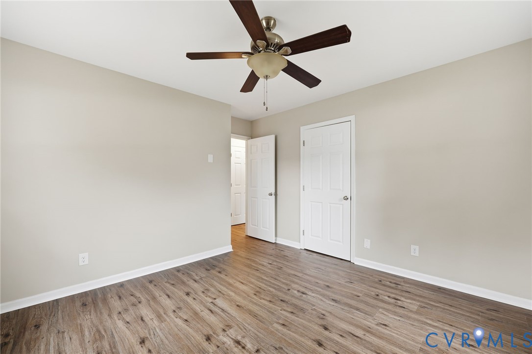 5106 Conduit Road Colonial Heights, VA 23834 - Photo 13 of 26 Unfurnished bedroom with wood finished floors and