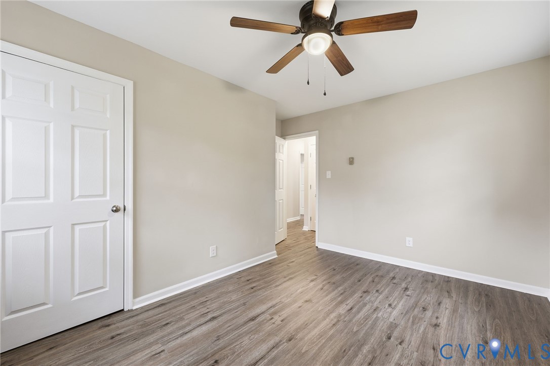 5106 Conduit Road Colonial Heights, VA 23834 - Photo 18 of 26 Unfurnished bedroom featuring wood finished floors