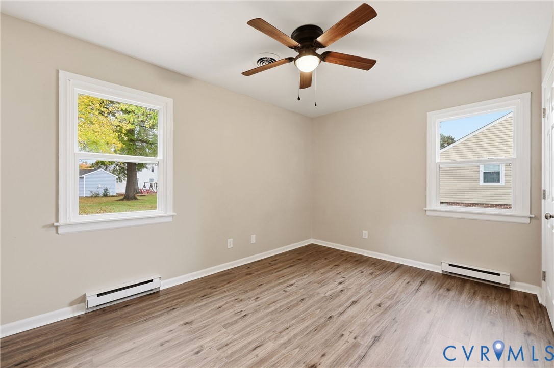 5106 Conduit Road Colonial Heights, VA 23834 - Photo 19 of 26 Spare room with light wood finished floors, basebo