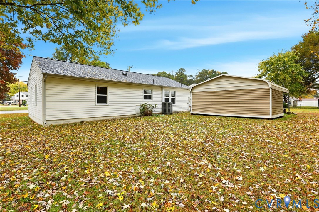5106 Conduit Road Colonial Heights, VA 23834 - Photo 23 of 26 Rear view of house featuring roof with shingles an