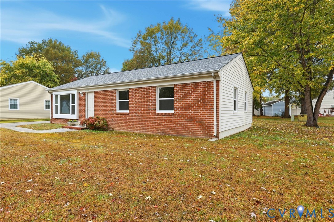 5106 Conduit Road Colonial Heights, VA 23834 - Photo 4 of 26 View of front facade featuring a front lawn, brick