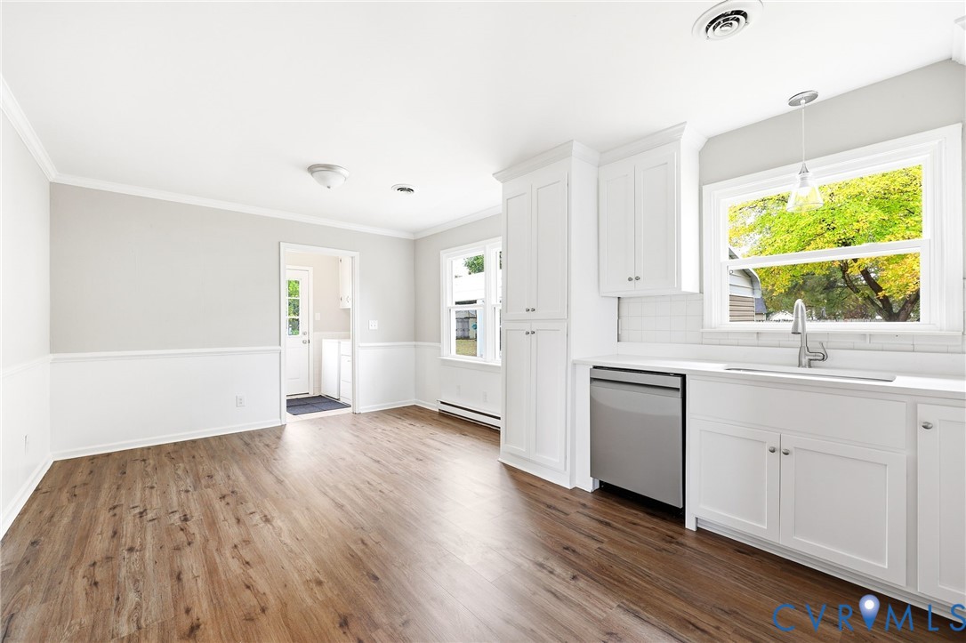 5106 Conduit Road Colonial Heights, VA 23834 - Photo 8 of 26 Kitchen featuring white cabinets, dark wood-style