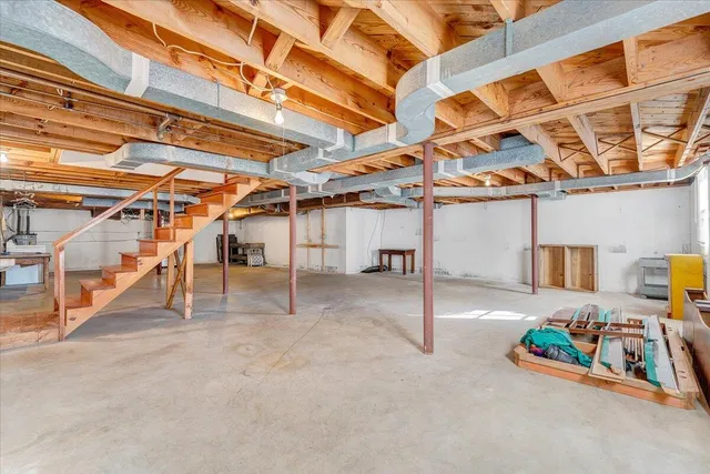 a view of an empty room with a couch