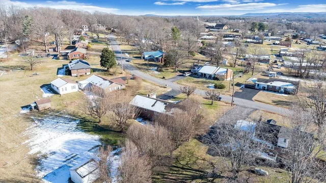 an aerial view of a city with lots of residential buildings