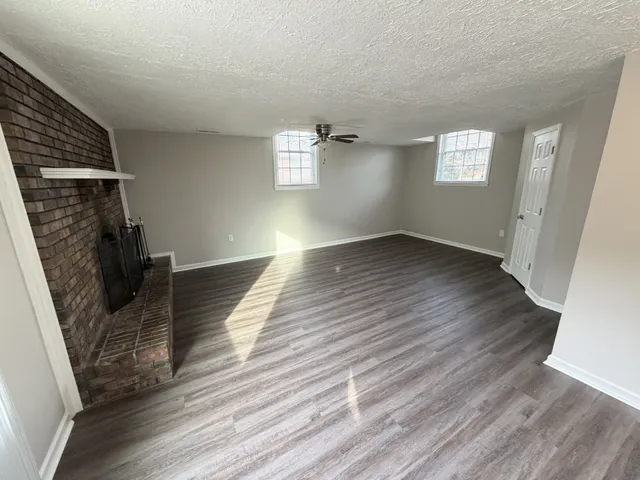 a view of a house with a sink and yard